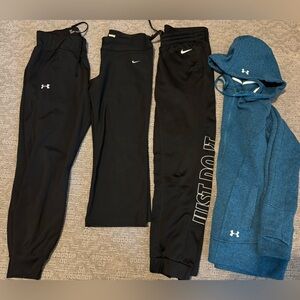 Under Armour and Nike women’s medium